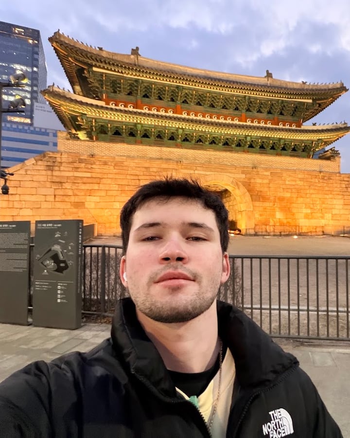 Francis LiButti in front of Sungnyemun Gate in Seoul